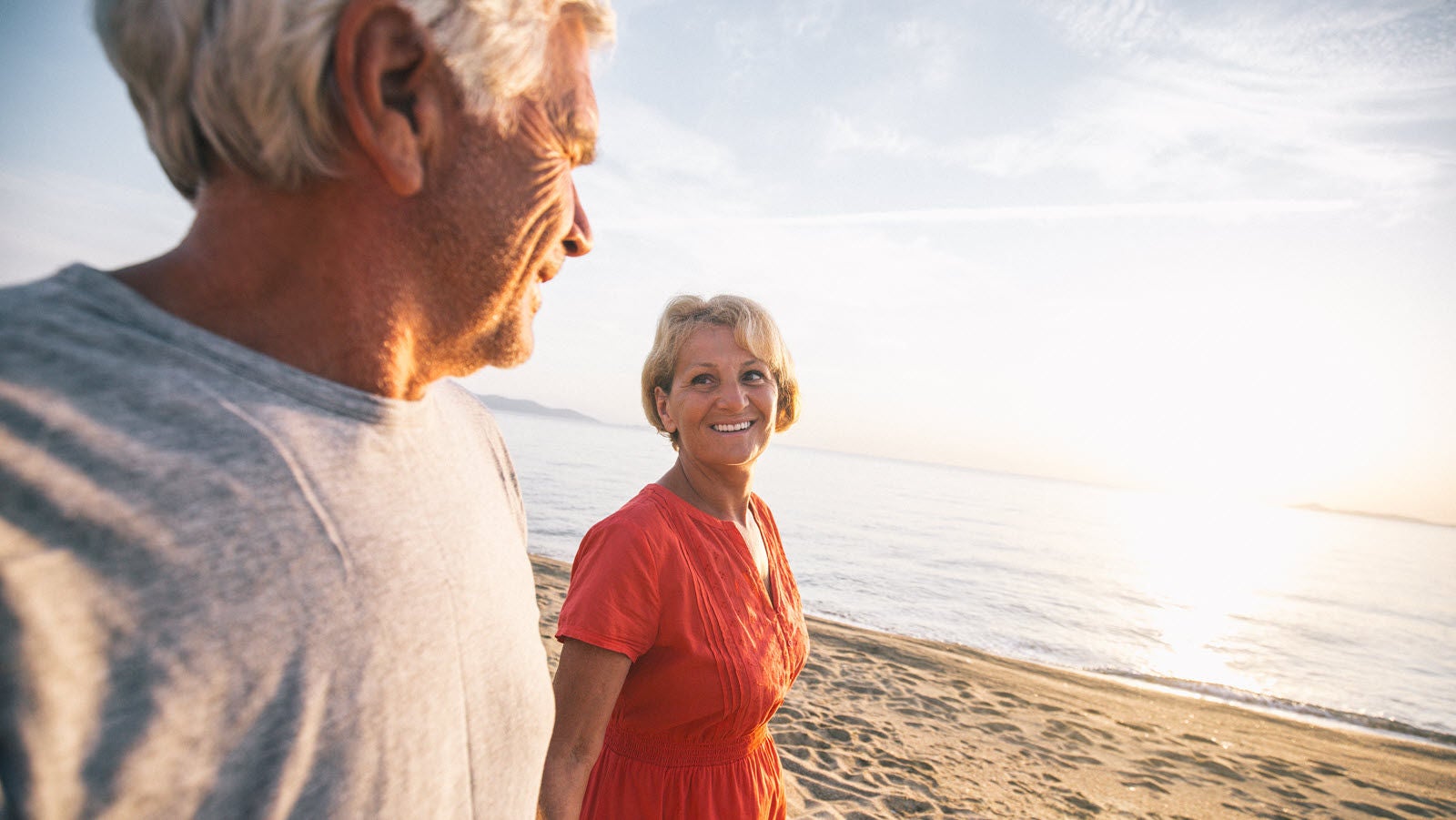 mature couple enjoying retirement at the beach